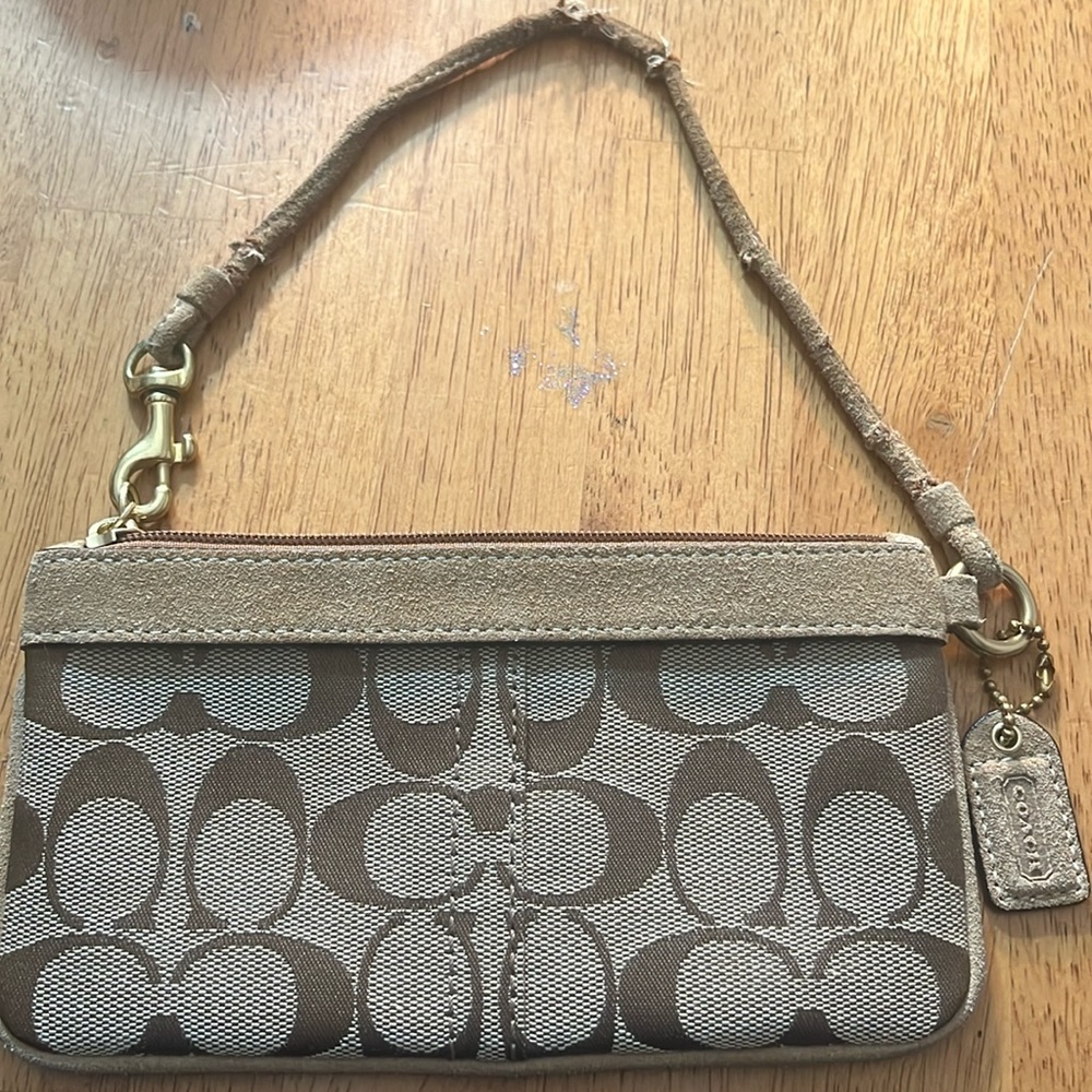 SMALL COACH PURSE (needs new strap) so it’s only $15